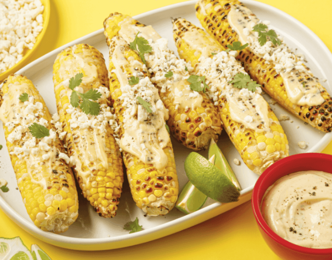 Découvrir la recette de maïs grillés avec mayonnaise épicée feta-lime
